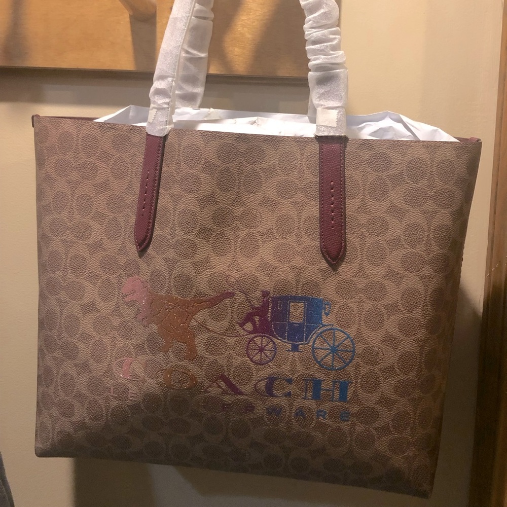 RARE COACH TOTE NEW Limited Edition!
Signature Rexy Carriage Print Original tags